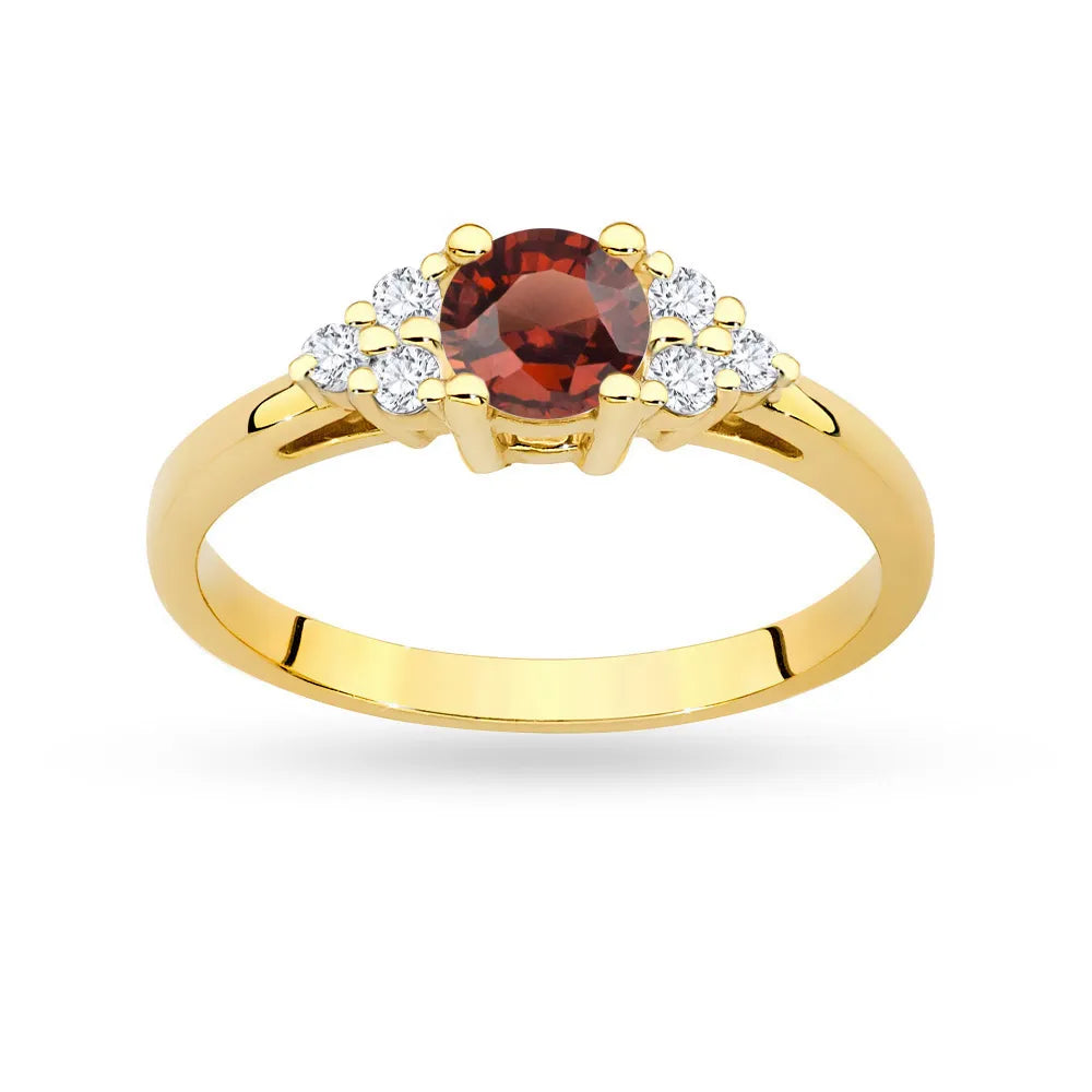 Prsteň zo 14-karátového zlata (585) so 0,60 ct granátom a 6 diamantmi. Perfektný ako darček.