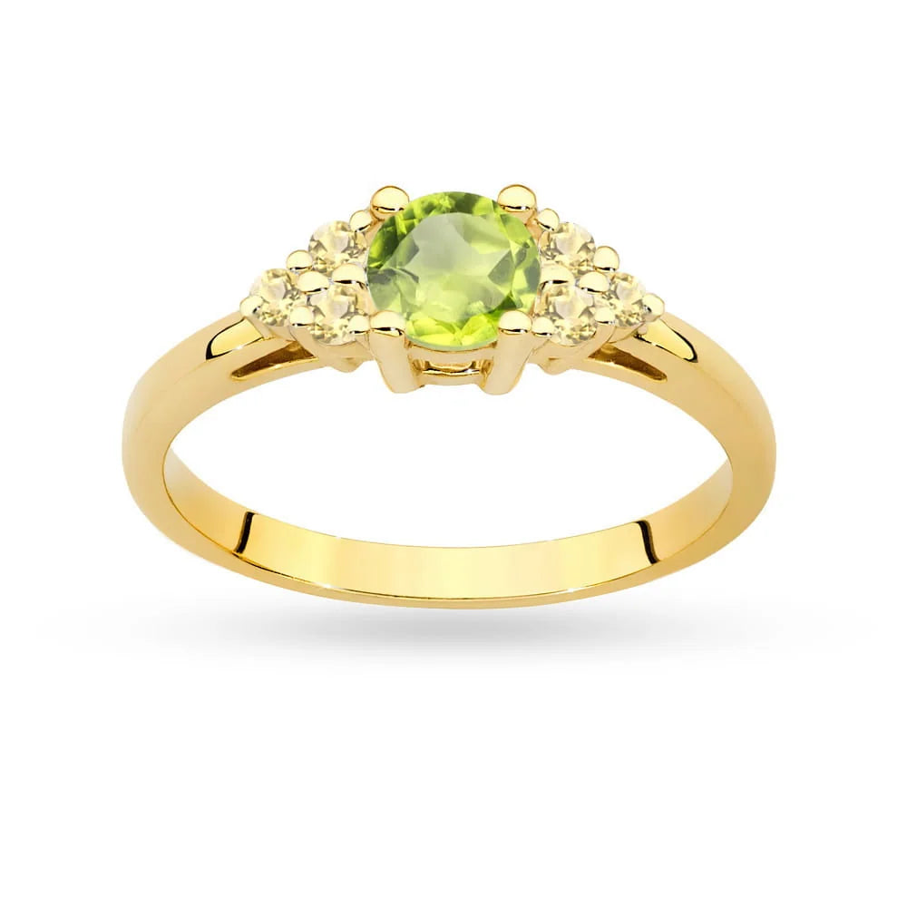 Prsteň zo žltého zlata 14k(585) s olivínom 0,60 ct a 6 bronzovými diamantmi. Perfektný ako darček.