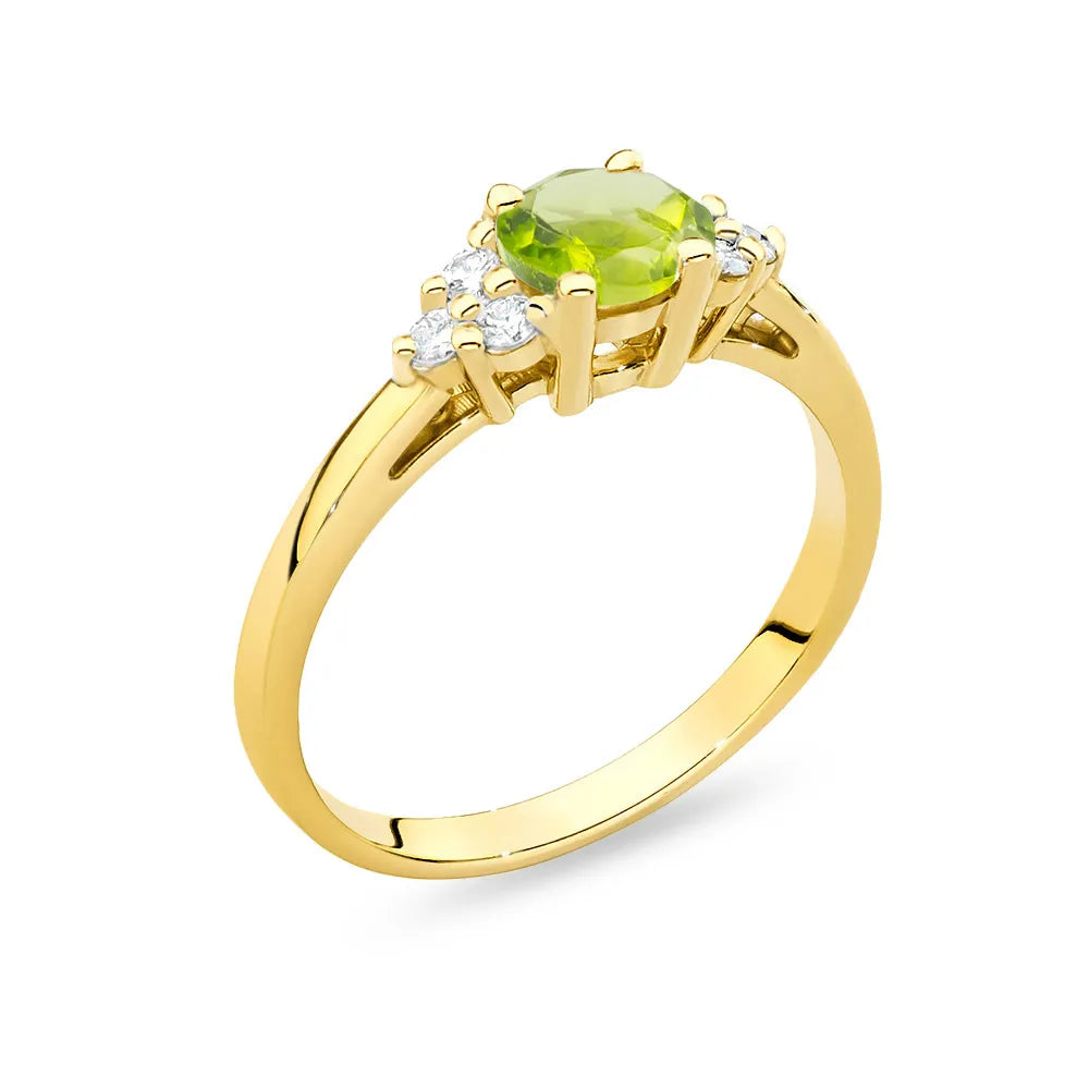 Gold 14k(585) ring with 0,60ct olivine with 6 diamonds. Perfect for a gift.