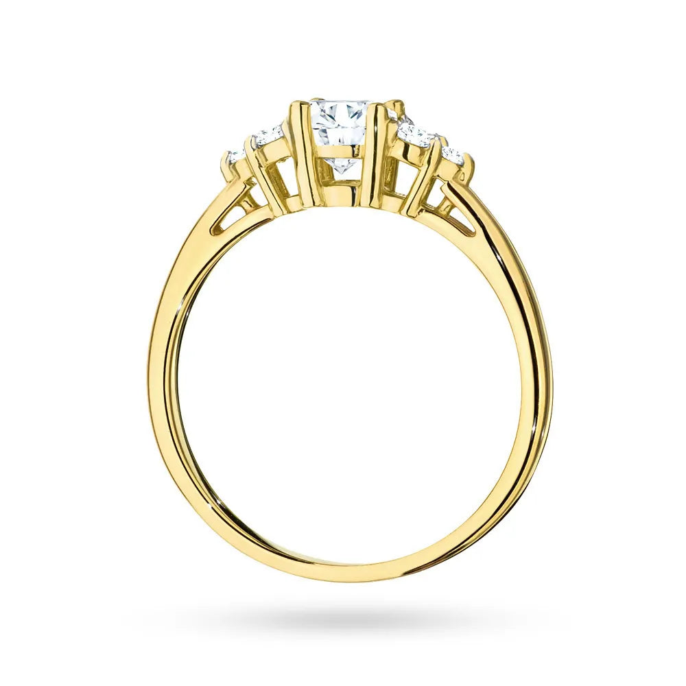 Gold 14k(585) ring with 0,60ct white sapphire with 6 diamonds. Perfect for a gift.