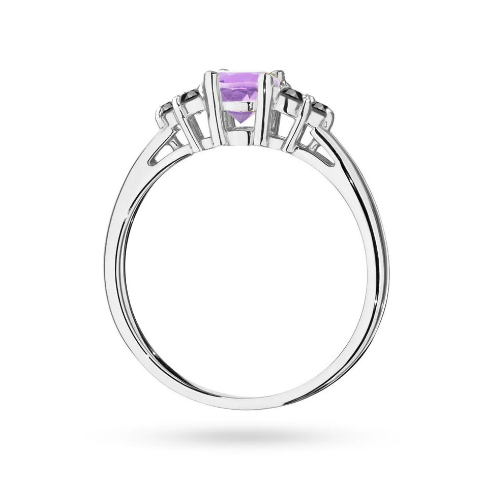 Prsteň z bieleho zlata 14k(585) s ametystom 0,50 ct a 6 bronzovými diamantmi. Perfektný ako darček.
