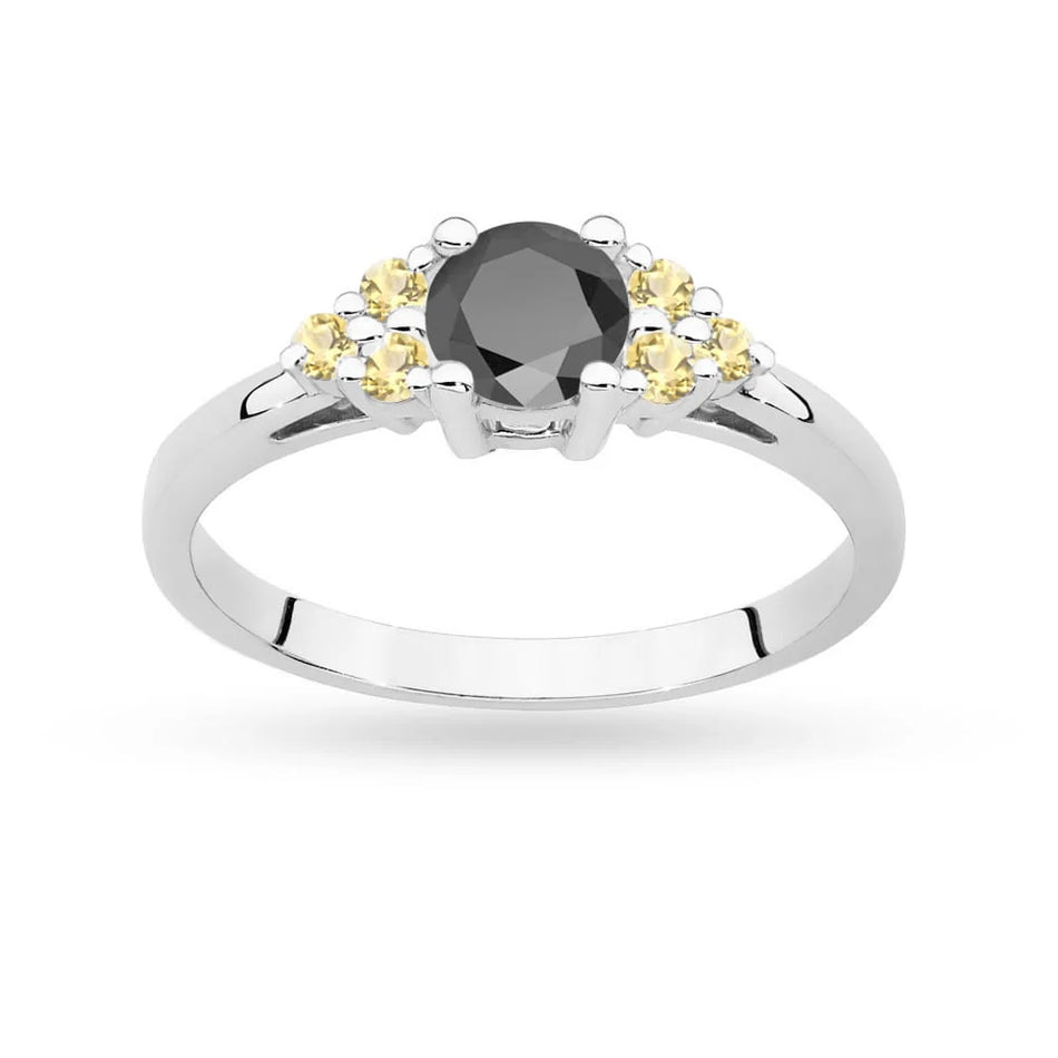 Prsteň z bieleho zlata 14k(585) s čiernym diamantom 0,50 ct a 6 bronzovými diamantmi. Perfektný ako darček.