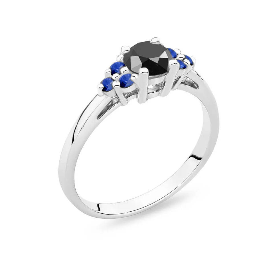 Prsteň z bieleho zlata 14k(585) s čiernym diamantom 0,50 ct a 6 zafírmi. Perfektný ako darček.