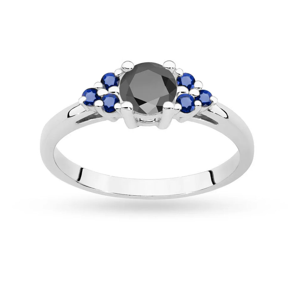 Prsteň z bieleho zlata 14k(585) s čiernym diamantom 0,50 ct a 6 zafírmi. Perfektný ako darček.