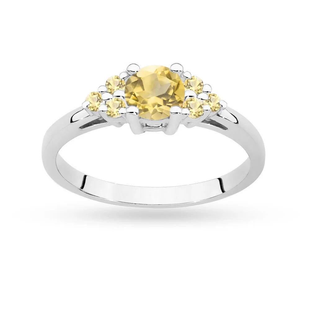 Prsteň z bieleho zlata 14k(585) s 0,50 ct citrínom a 6 bronzovými diamantmi. Perfektný ako darček.