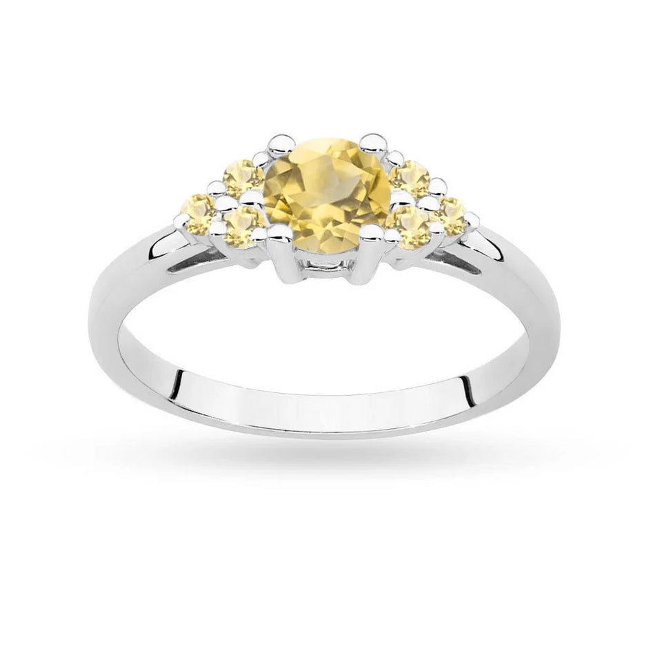 Prsteň z bieleho zlata 14k(585) s 0,50 ct citrínom a 6 bronzovými diamantmi. Perfektný ako darček.