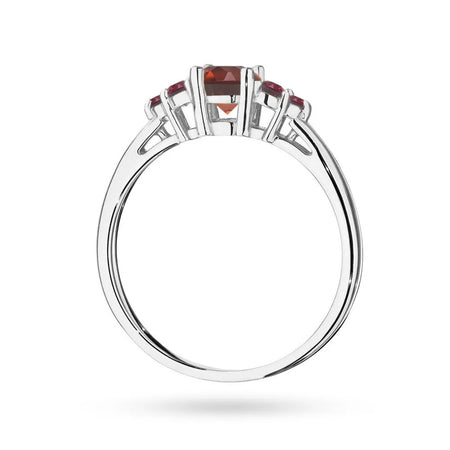 Prsteň z bieleho zlata 14k(585) so 0,60 ct granátom a 6 rubínmi. Perfektný ako darček.