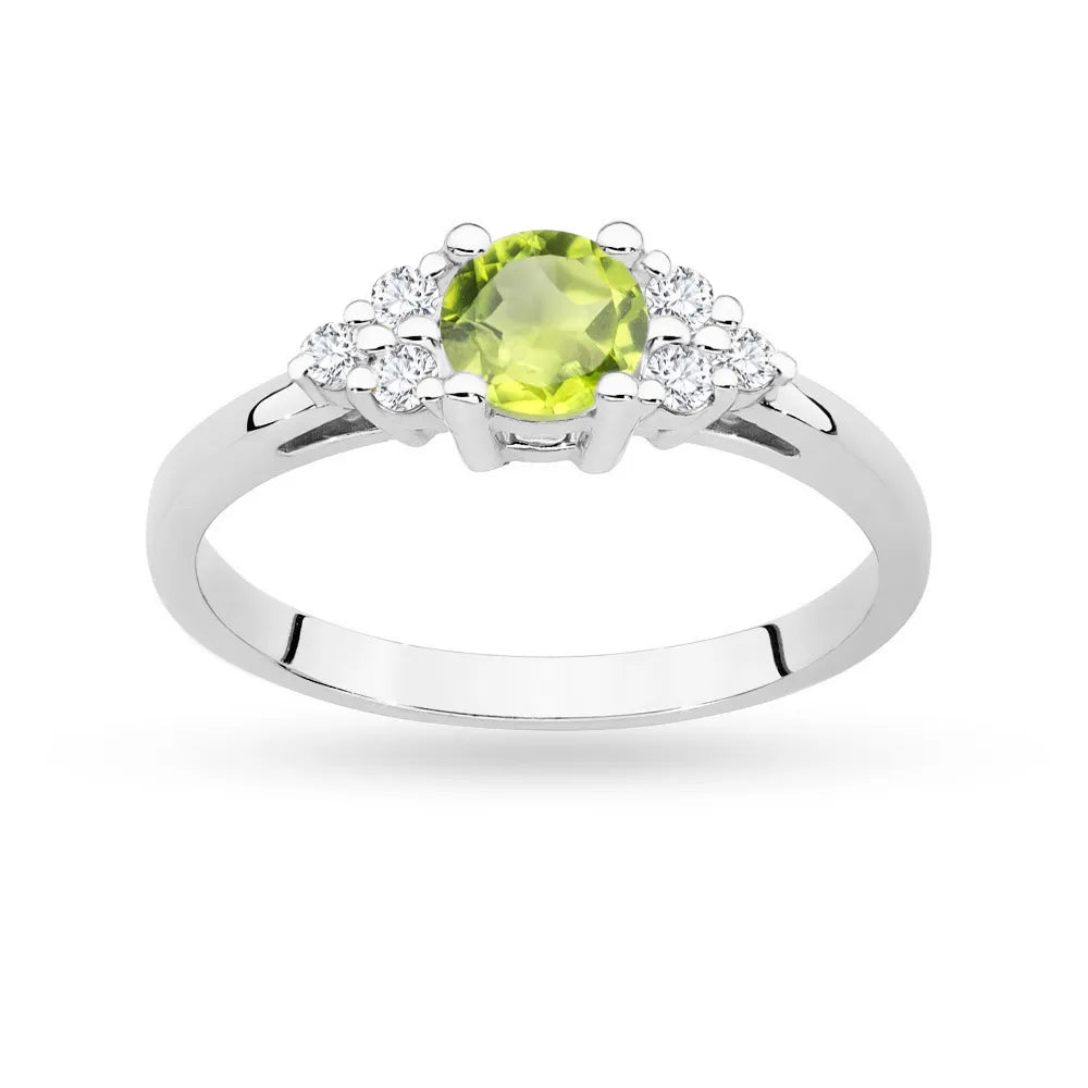 White Gold 14k(585) ring with 0,60ct olivine with 6 diamonds. Perfect for a gift.