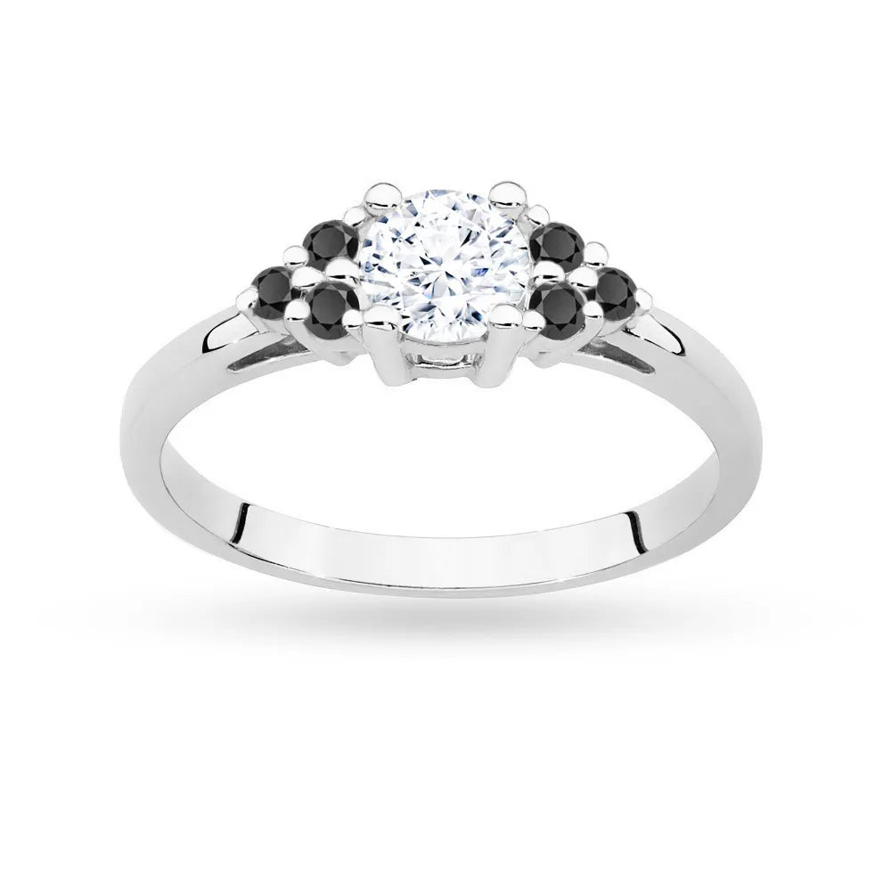 White Gold 14k(585) ring with 0,60ct white sapphire with 6 black diamonds. Perfect for a gift.