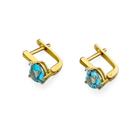 Náušnice zo 14-karátového zlata s 1,20 ct srdcovým topásom a diamantmi. Zabalené v elegantnej krabičke, sú ideálne ako darček.