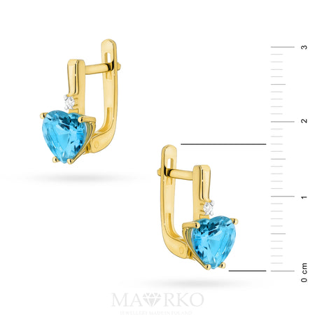 Náušnice zo 14-karátového zlata s 1,20 ct srdcovým topásom a diamantmi. Zabalené v elegantnej krabičke, sú ideálne ako darček.