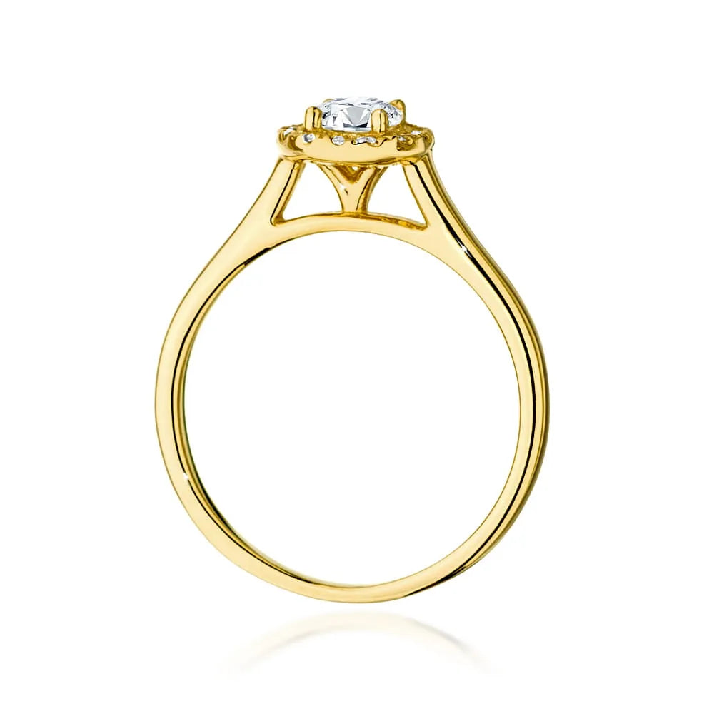 Prsteň zo žltého zlata 14k(585) s diamantom 0,40 ct a postrannými diamantmi 0,12 ct. Perfektný ako darček.