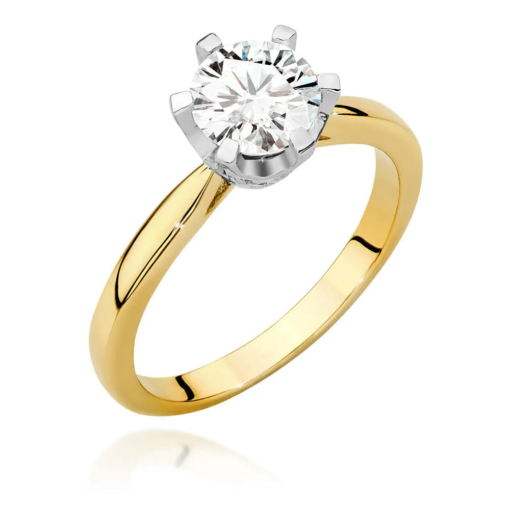 Prsteň zo žltého zlata 14k(585) s diamantom 1 ct a postrannými diamantmi 0,06 ct. Perfektný ako darček.