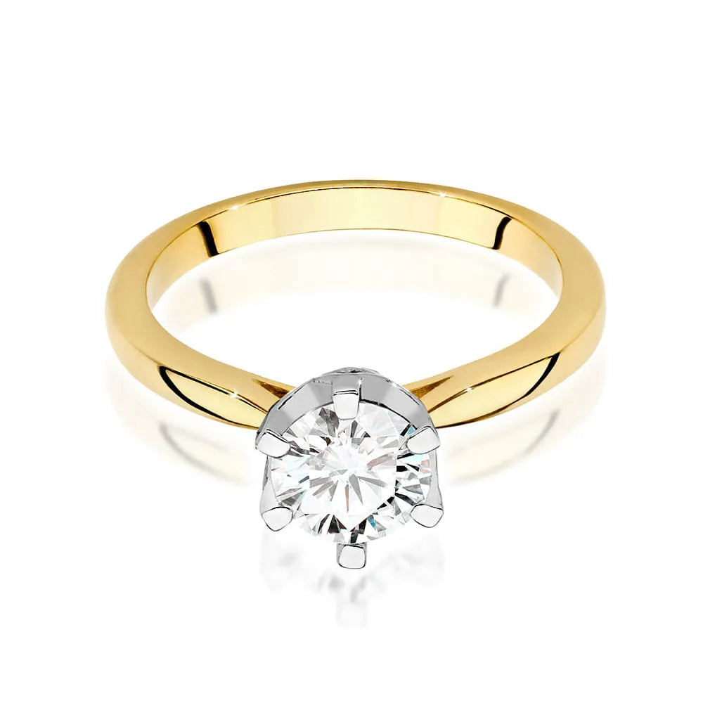 Prsteň zo žltého zlata 14k(585) s diamantom 1 ct a postrannými diamantmi 0,06 ct. Perfektný ako darček.