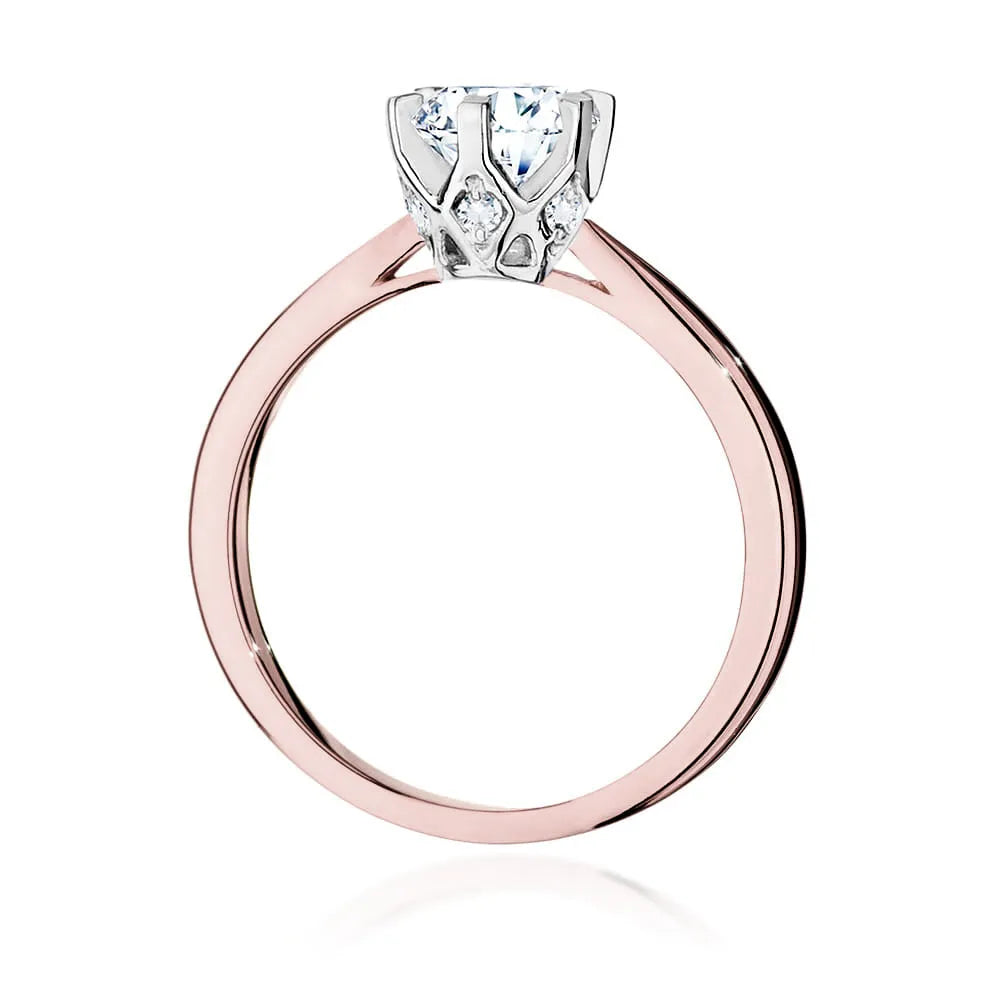Rose Gold 14k(585) ring with 1ct diamond and 0,06ct side diamonds.  Perfect for a gift.