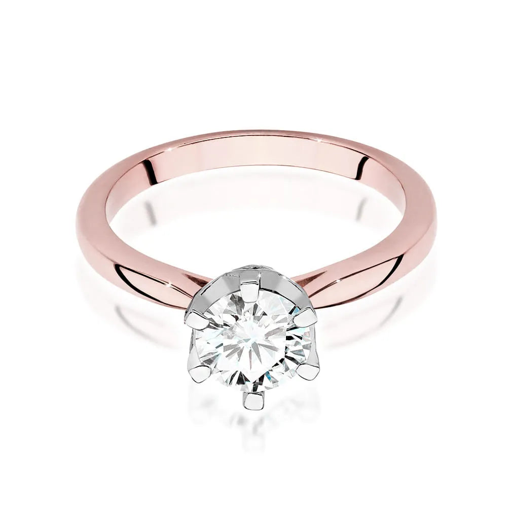 Rose Gold 14k(585) ring with 1ct diamond and 0,06ct side diamonds.  Perfect for a gift.