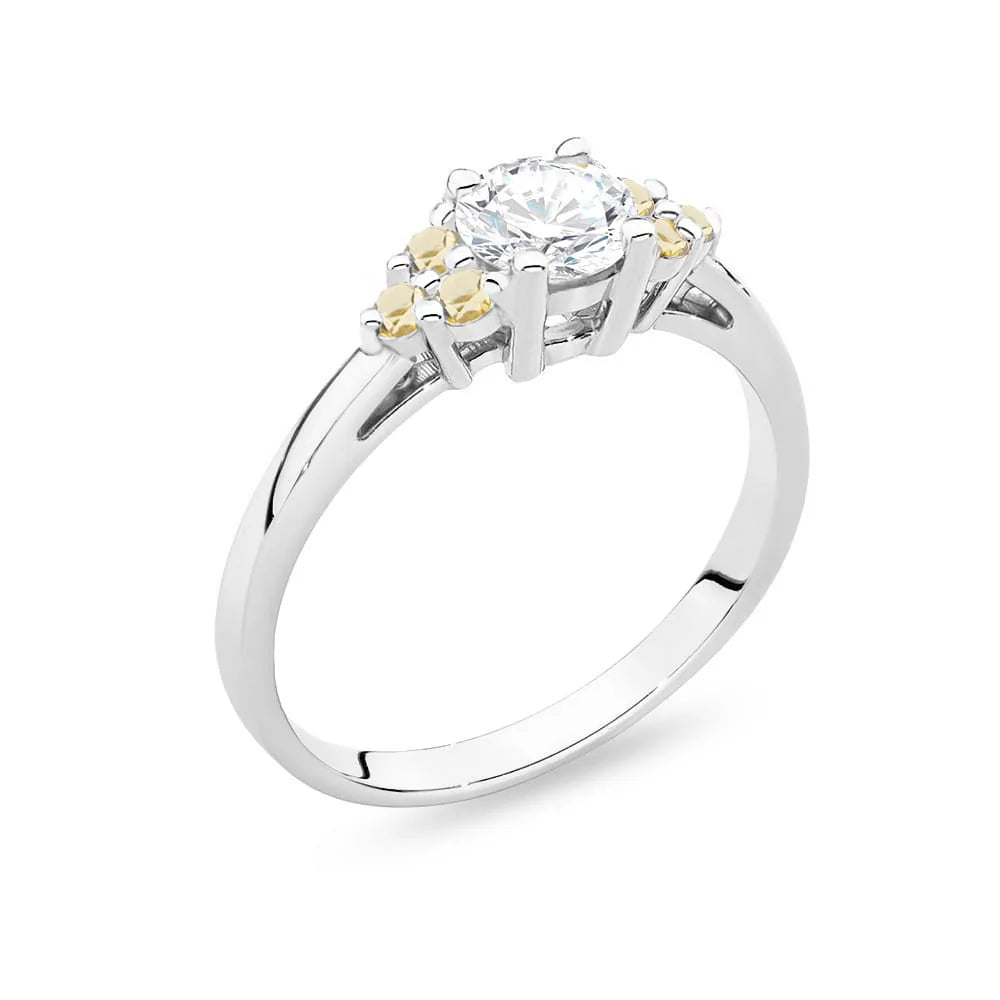 White Gold 14k(585) ring with 0,60ct white sapphire with 6 bronze diamonds. Perfect for a gift.
