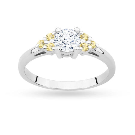 White Gold 14k(585) ring with 0,60ct white sapphire with 6 bronze diamonds. Perfect for a gift.
