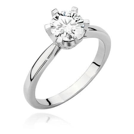 White Gold 14k(585) ring with 1ct diamond and 0,06ct side diamonds.  Perfect for a gift.