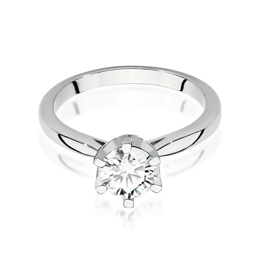 White Gold 14k(585) ring with 1ct diamond and 0,06ct side diamonds.  Perfect for a gift.