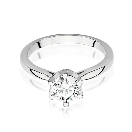 White Gold 14k(585) ring with 1ct diamond and 0,06ct side diamonds.  Perfect for a gift.