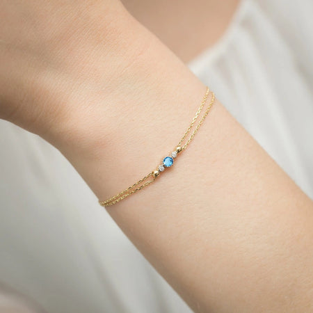 zlatý náramok s 0,15 ct topásom a 0,029 ct diamantmi b0005-tob-01