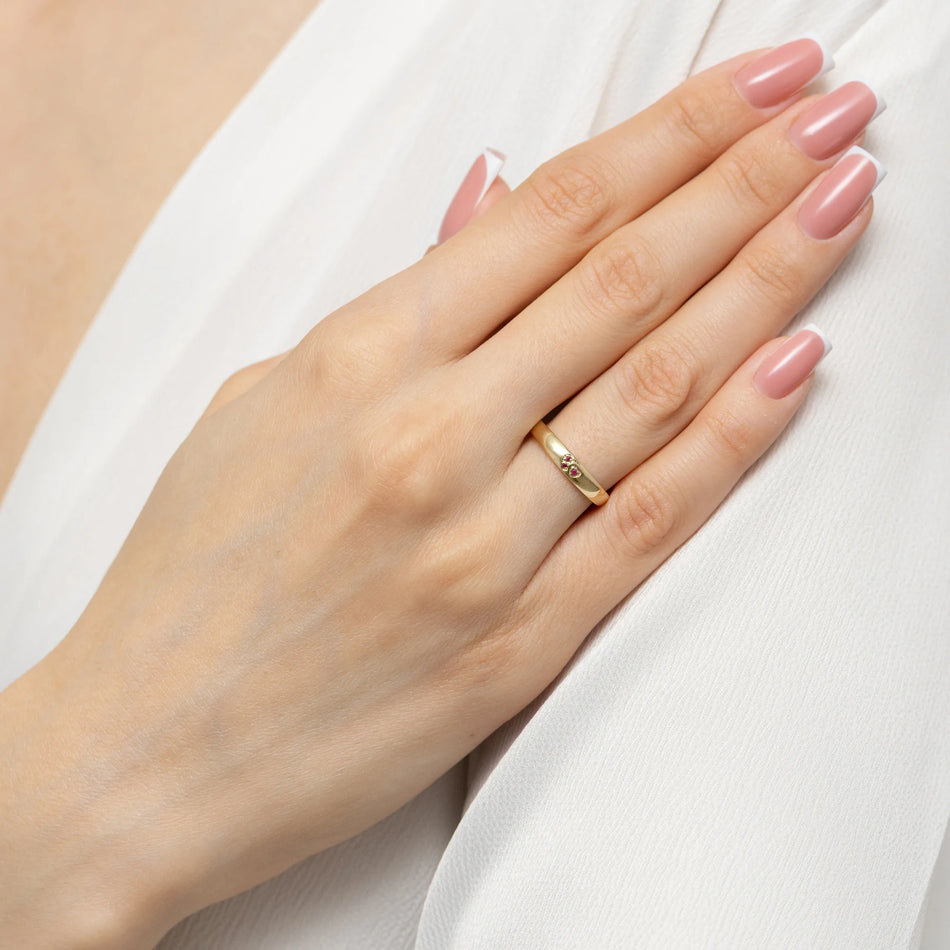 14k gold ring with 2 red zirconia hearts. Classic design with modern twist. Packed in black box, paper, and gift bag.