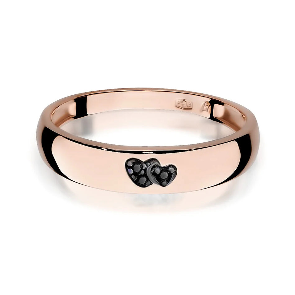 14k rose gold ring with 2 black zirconia hearts. Classic design with modern twist. Packed in black box, paper, and gift bag.