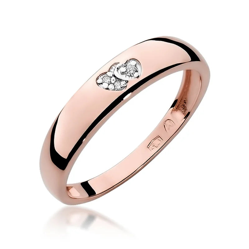 14k rose gold ring with 2 white zirconia hearts. Classic design with modern twist. Packed in black box, paper, and gift bag.
