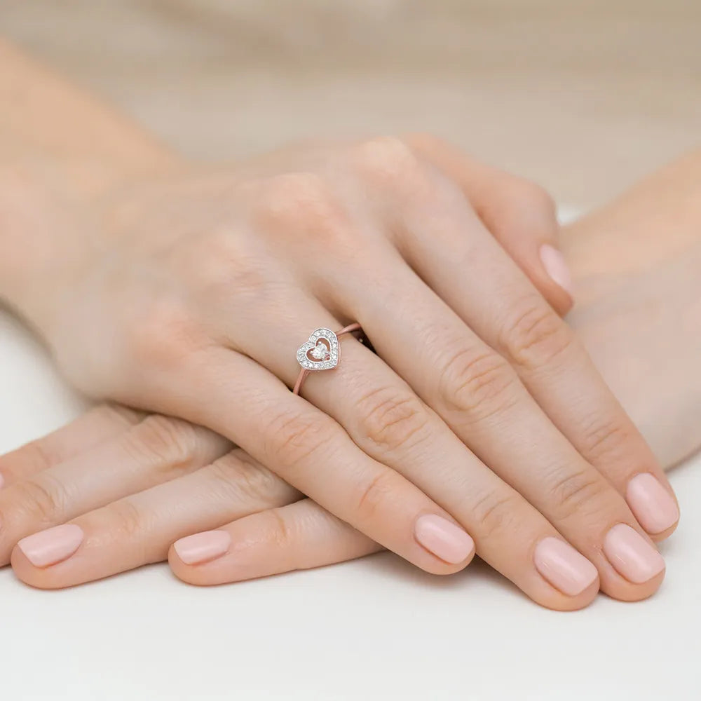 14K rose gold ring with 0.10ct diamond and 18 diamonds of total mass 0.09ct. Ring is packed in black box, paper and gift bag.