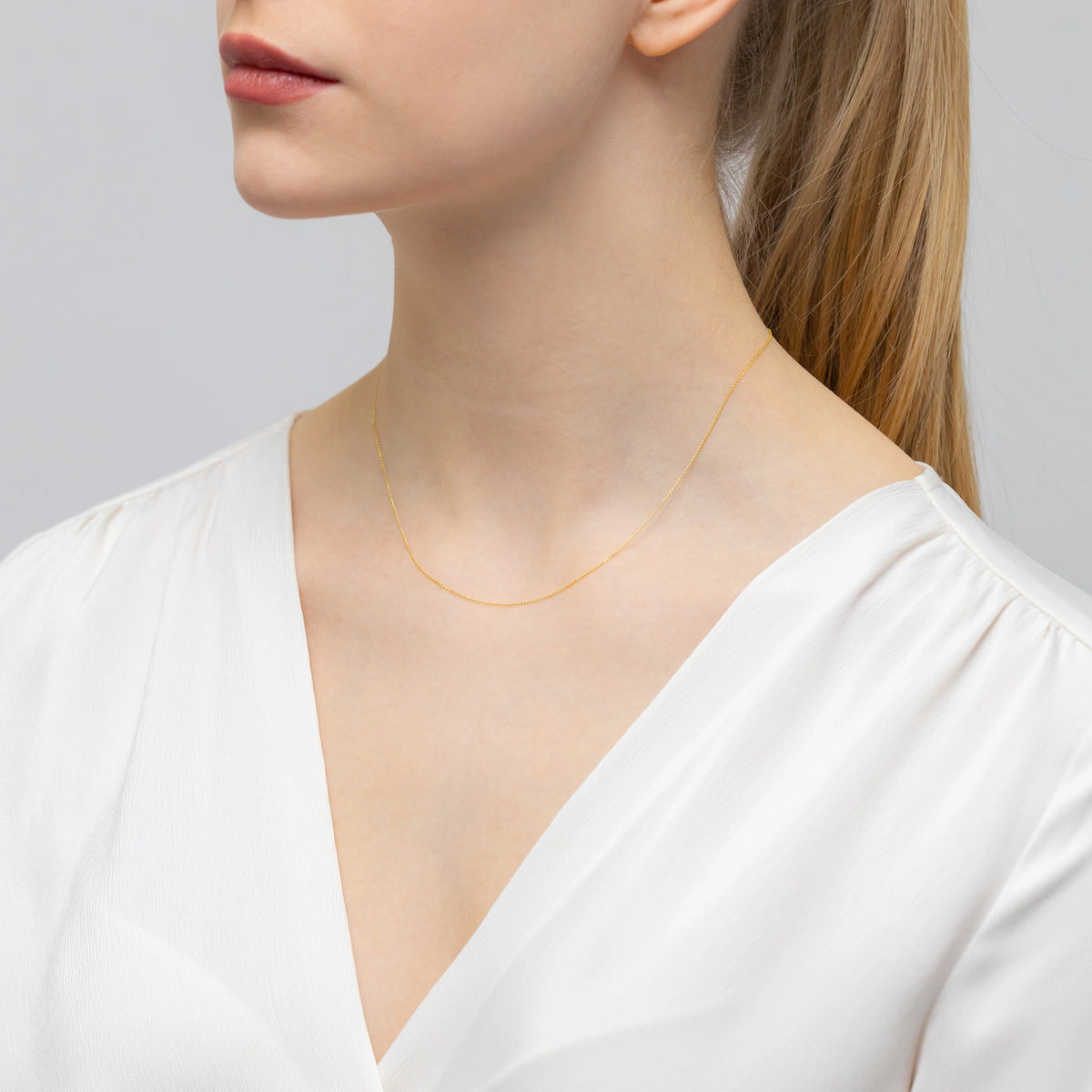 gold-curb-chain-0-7mm-l206-585