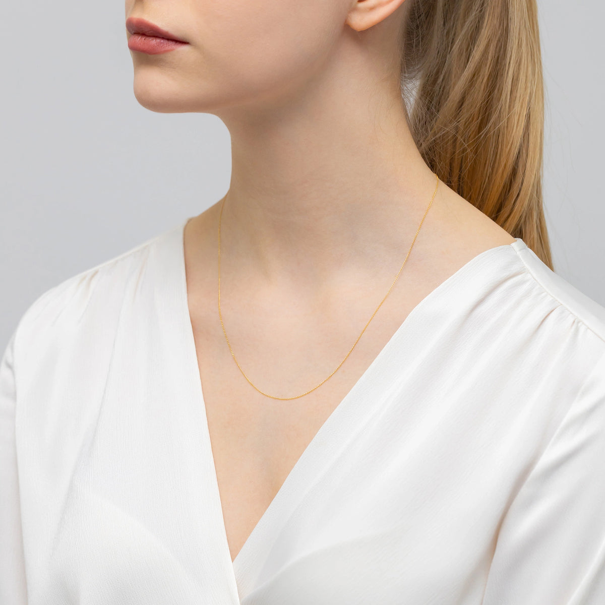 gold-curb-chain-0-7mm-l206-585