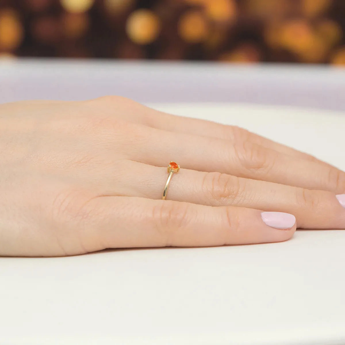 gold-ring-with-0-15ct-garnet-p129-585-g0-15