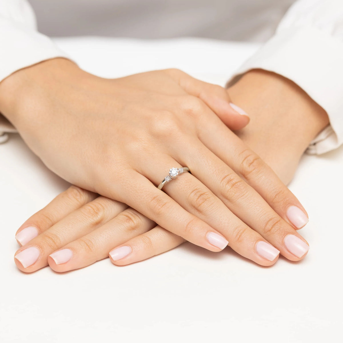 White Gold engagement ring with Round 0.25 ct Central and 0.07 ct Sideline Lab-grown Diamonds - GREMARI fine jewelry