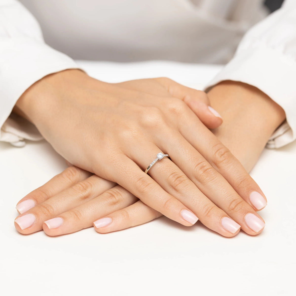 White Gold engagement ring with Round 0.25 ct Central and 0.07 ct Sideline Lab-grown Diamonds - GREMARI fine jewelry