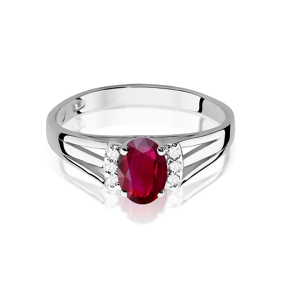 Zlatý prsteň s 0,60 ct rubínom a diamantmi