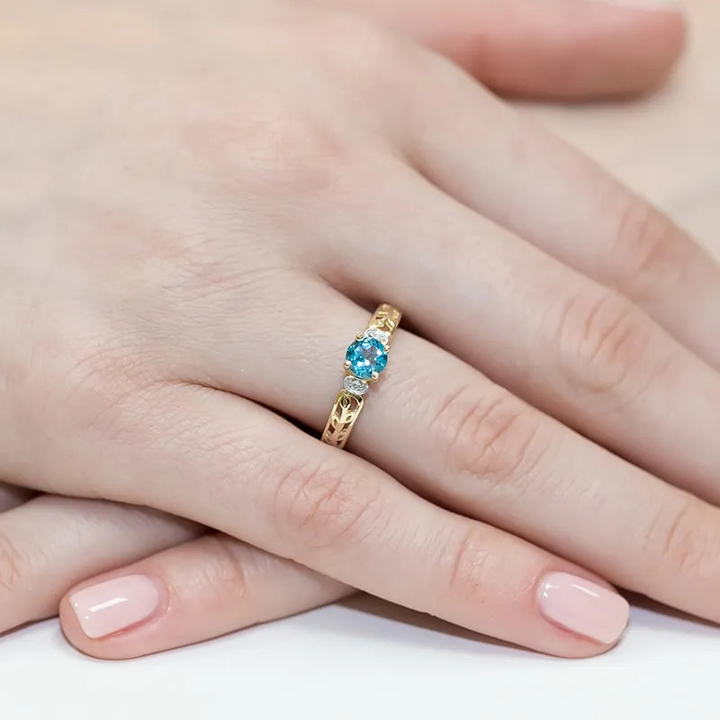 zlatý prsteň s topásom 0,50 ct a diamantmi 0,02 ct w0014-tob-01