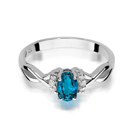 zlatý prsteň s 0,50 ct topásom london blue a 0,052 ct diamantmi w0019-tol-01