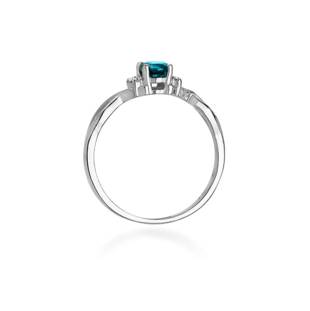 zlatý prsteň s 0,50 ct topásom london blue a 0,052 ct diamantmi w0019-tol-01