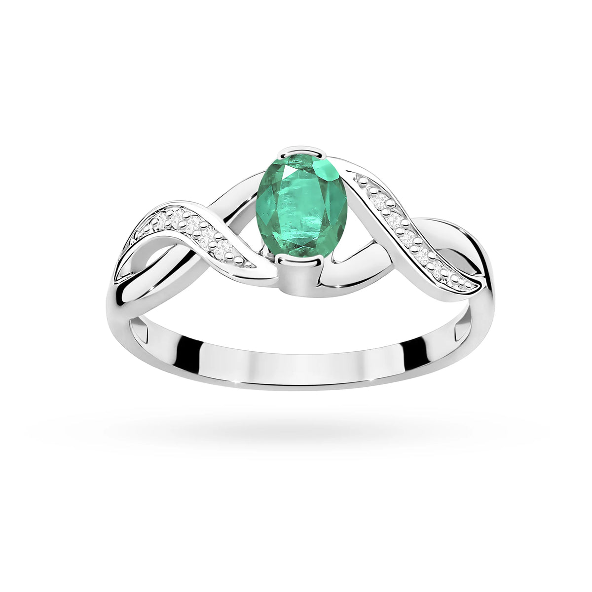 Prsteň nekonečna z bieleho 14k zlata s oválnym smaragdom 0,40 ct a diamantmi 0,05 ct