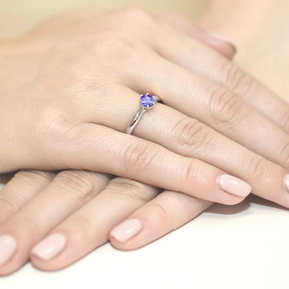 zlatý prsteň s 0,50 ct tanzanitom a diamantmi w0074-tap-01
