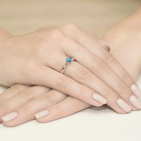 gold-ring-with-0-50ct-topaz-london-blue-and-0-01ct-diamonds-w0074-tol-01