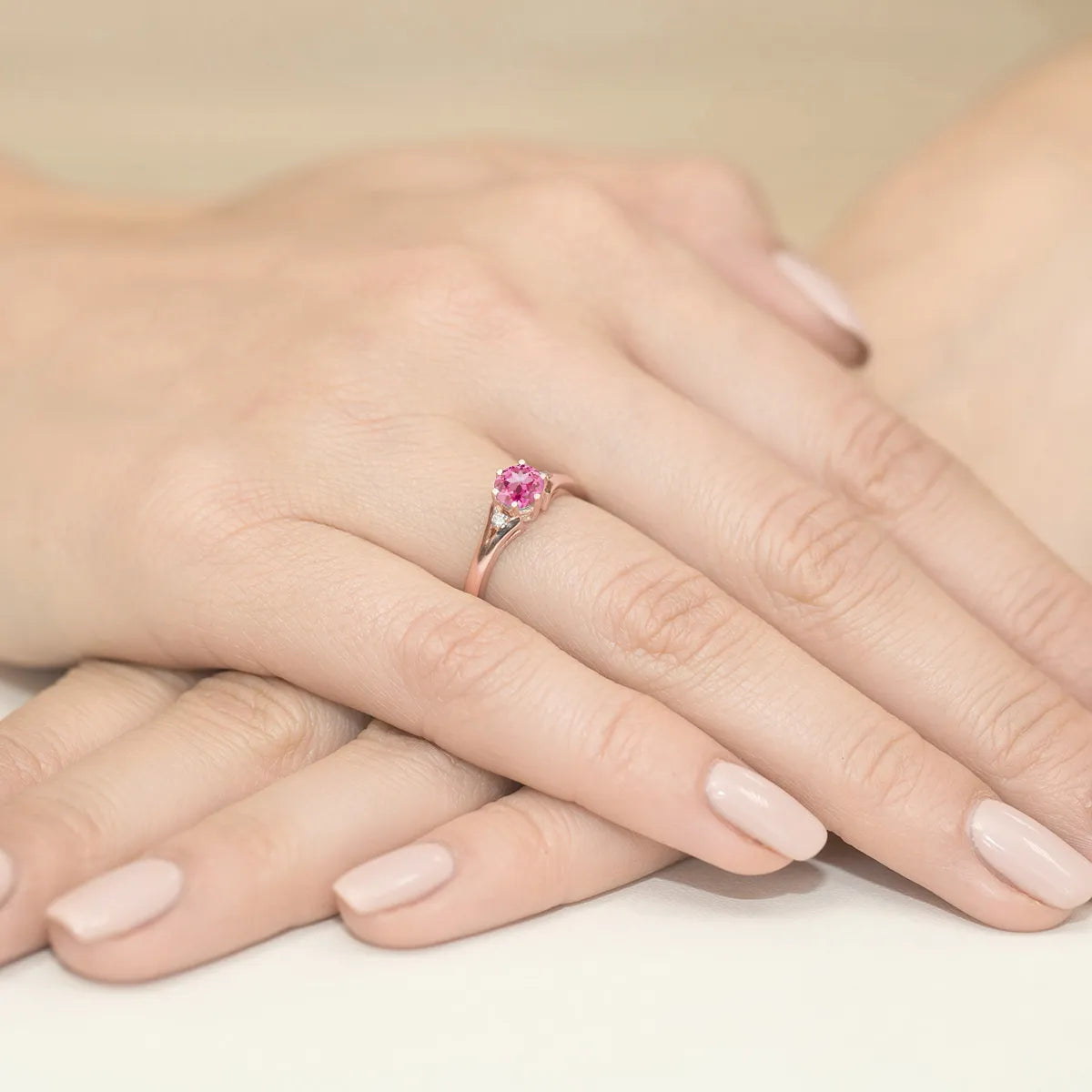 gold-ring-with-0-60ct-pink-topaz-and-diamonds-w0076-top-01