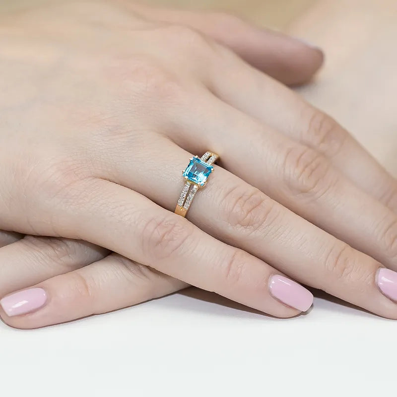 gold-ring-with-1-10ct-topaz-and-0-06ct-diamonds-w0079-tob-01