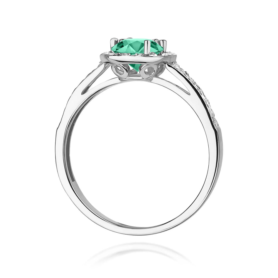 Prsteň z bieleho zlata s 0,50 ct smaragdom a 0,20 ct diamantmi