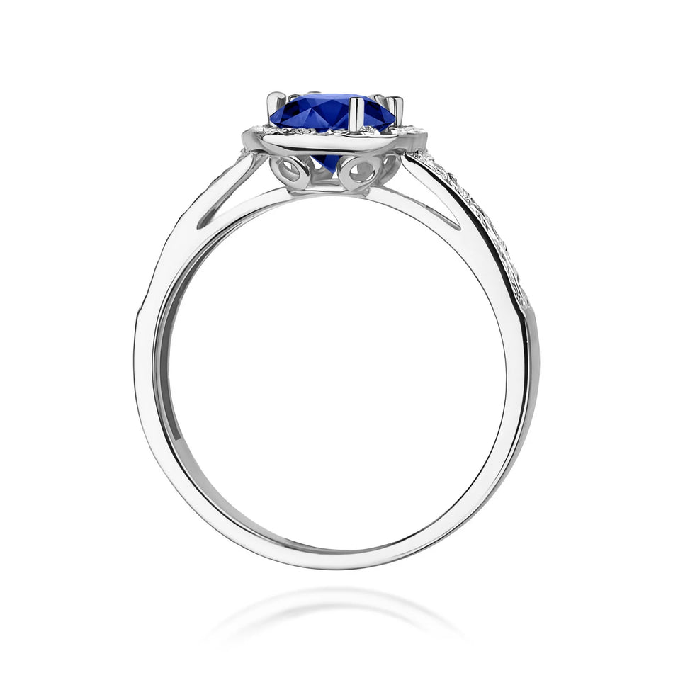 Prsteň z bieleho zlata so zafírom 0,50 ct a diamantmi 0,20 ct