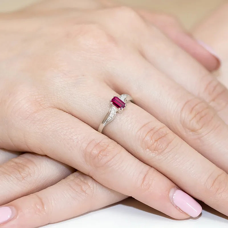 zlatý prsteň s 0,70 ct granátom a 0,03 ct diamantmi w0094-gar-01