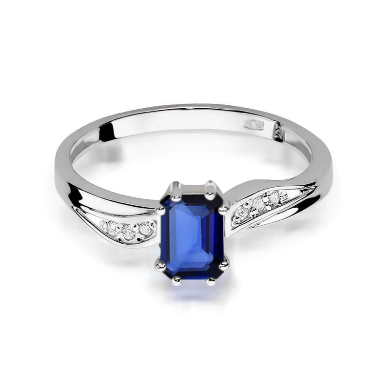 zlatý prsteň s 0,60 ct zafírom a 0,03 ct diamantmi w0094-sab-01