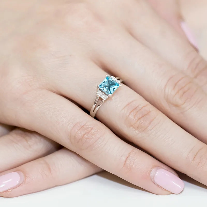 gold-ring-with-1-40ct-topaz-and-0-03ct-diamonds-w0103-tob-01