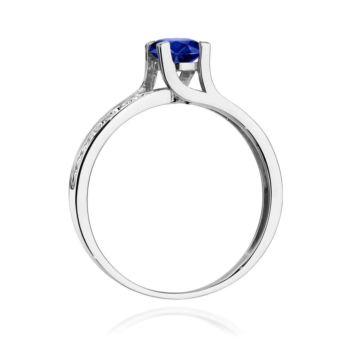 Halo prsteň z bieleho 14k zlata s okrúhlym modrým zafírom 0,50 ct a diamantmi 0,03 ct